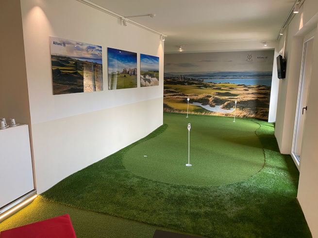Toronto indoor putting green in an office with scenic wall art